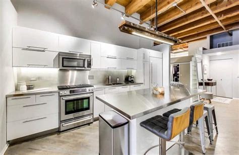 white cabinets with stainless steel countertops|white cabinets with concrete countertops.